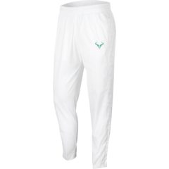 White tennis tracksuit bottoms with a green Rafa Nadal logo on the left thigh.